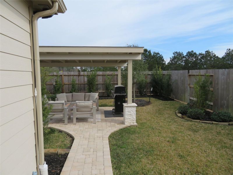 Exterior details and patio area of a home in Sagecrest Trails, Conroe (Image 38). Exterior details and patio area of a home in Sagecrest Trails, Conroe (Image 38).