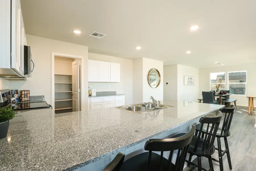 A kitchen with a large island.
