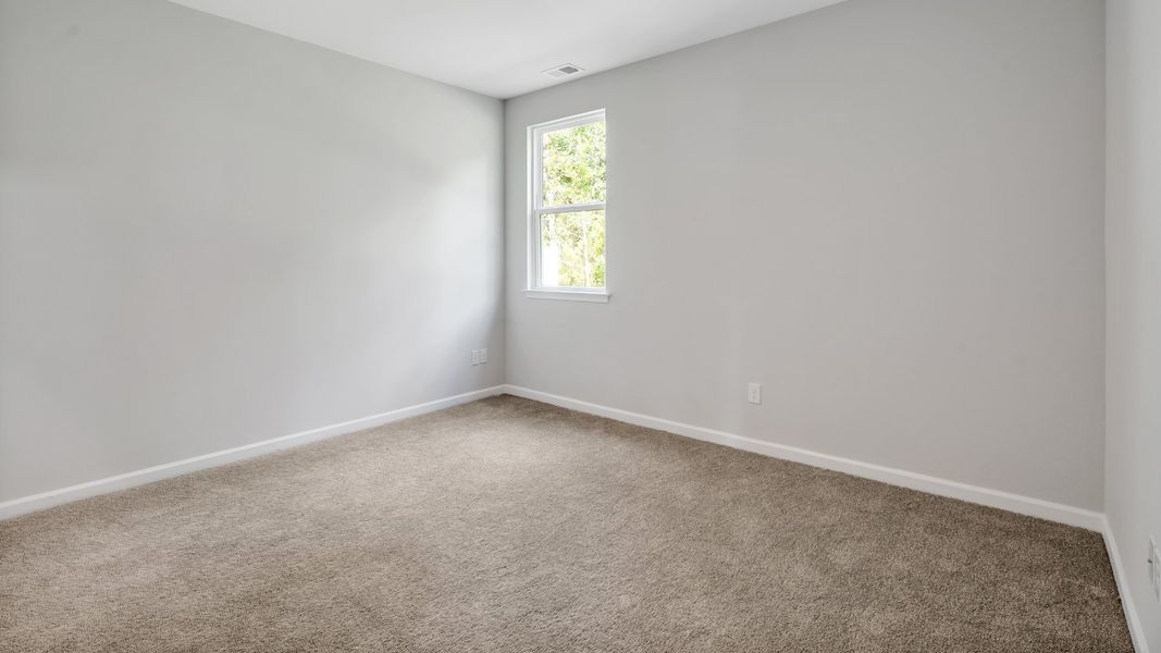 Spacious, unfurnished interior of a new home in The Pines at Blake Farm, Wilmington (Image 20).