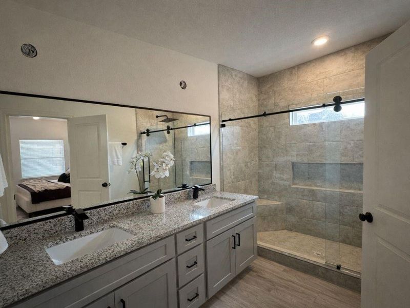 Furnished interior view inside a new home in Frontier Lakes, Willis (Image 5).