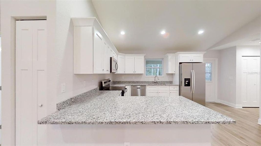 Furnished interior view inside a new home in , Dunnellon (Image 5).
