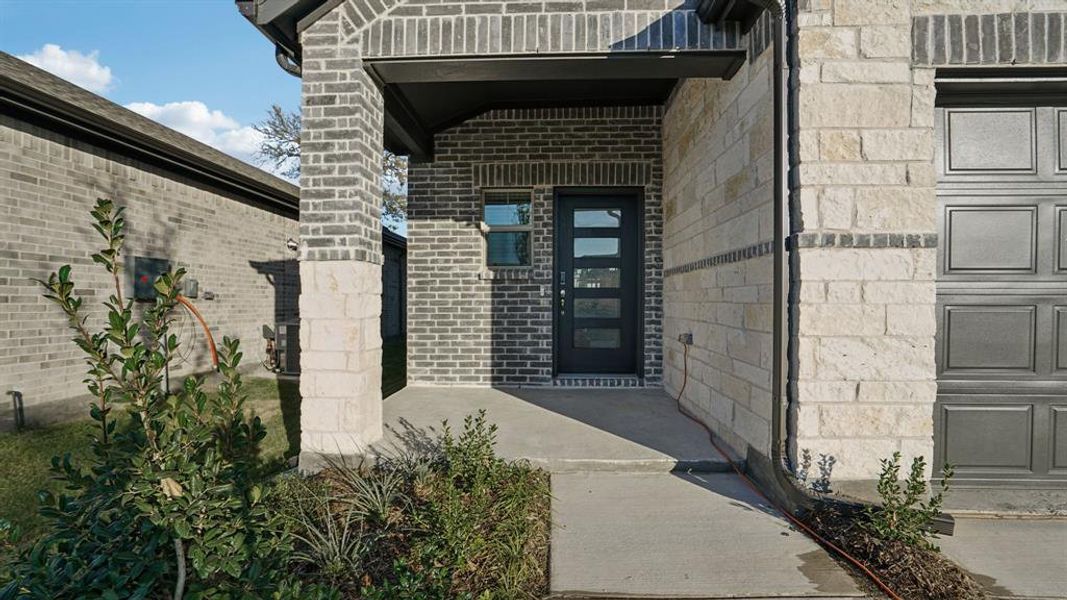 Exterior details and patio area of a home in Eastridge - Spring Series, McKinney (Image 3). Exterior details and patio area of a home in Eastridge - Spring Series, McKinney (Image 3).