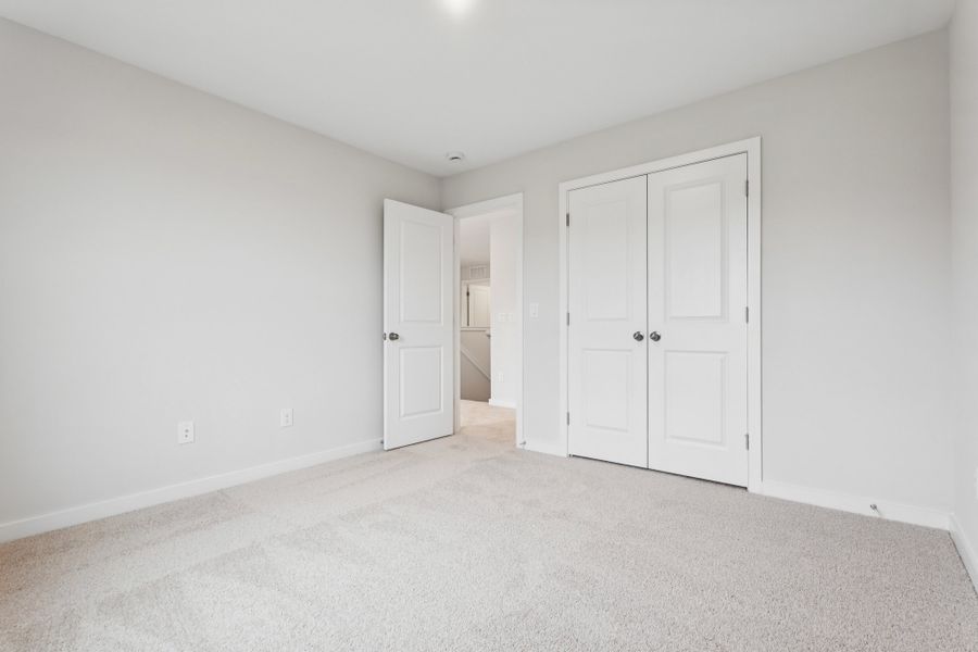 A room with white doors.