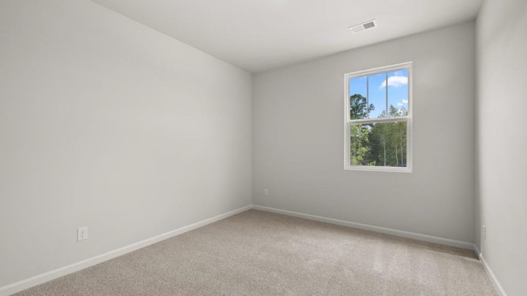 Spacious, unfurnished interior of a new home in Fairway 17 at Mirror Lake, Villa Rica (Image 22).