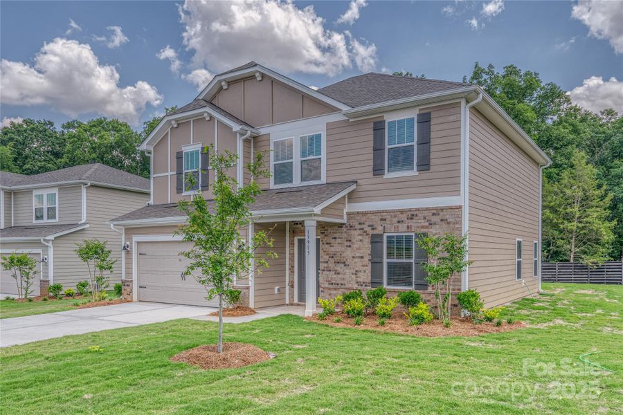Front exterior of a new home in Harper Landing, Stanley, NC, highlighting curb appeal (Image 1).
