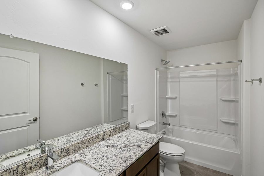 Furnished interior view inside a new home in Mandarina Reserve, Marana (Image 10).