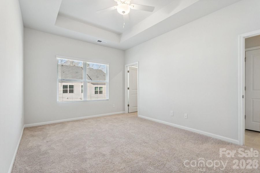 Primary Bedroom with 10' tray ceiling