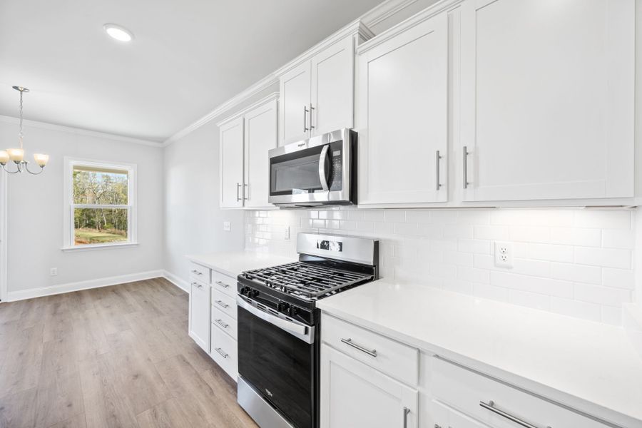 Furnished interior view inside a new home in Carriage Estates, Lexington (Image 6).