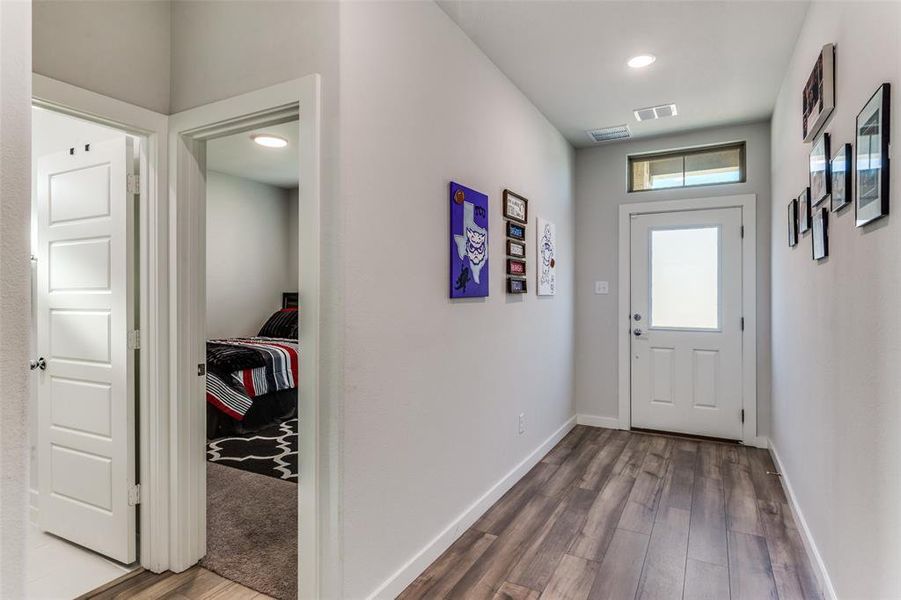 High grade vinyl flooring throughout most of downstairs