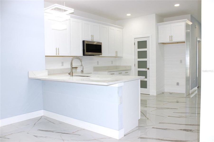 Furnished interior view inside a new home in , Tampa (Image 6).