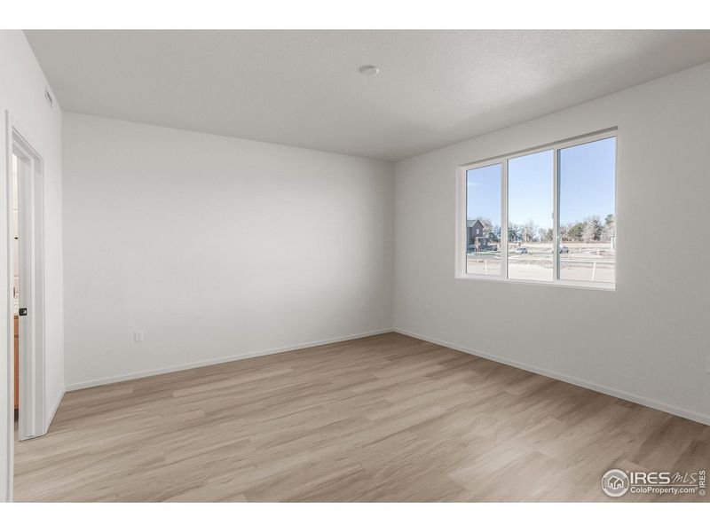 Spacious, unfurnished interior of a new home in Bloom Trailblazer Collection - Single Family Homes, Fort Collins (Image 23).
