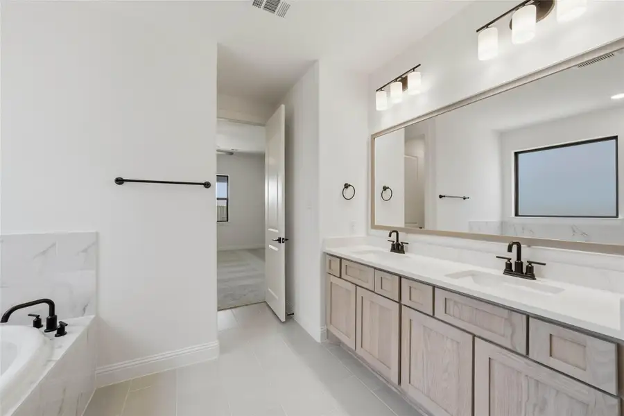 Furnished interior view inside a new home in Sienna 40', Missouri City (Image 9). Furnished interior view inside a new home in Sienna 40', Missouri City (Image 9).