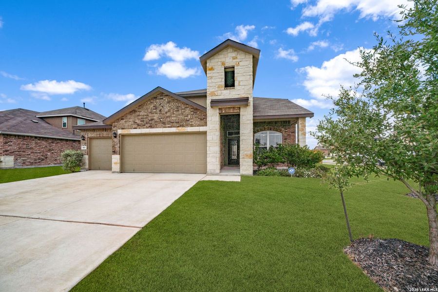 Front exterior of a new home in , Cibolo, TX, highlighting curb appeal (Image 22).