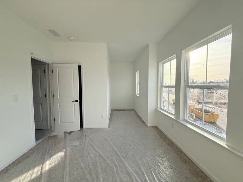 Bedroom 3 featuring AW Collection® Oxford -  Natural tones and timeless comfort.