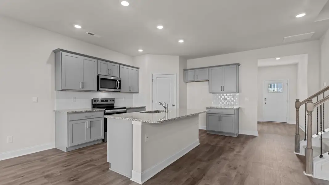 Furnished interior view inside a new home in Villa Grande, Winterville (Image 4).