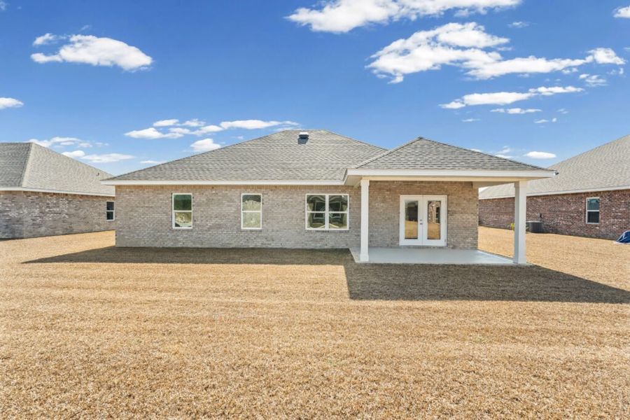 Exterior details and patio area of a home in Natureview, Freeport (Image 24).