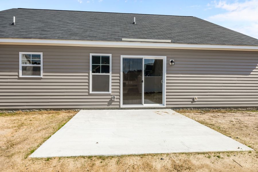 Exterior details and patio area of a home in Davenport Farms, Winterville (Image 24).