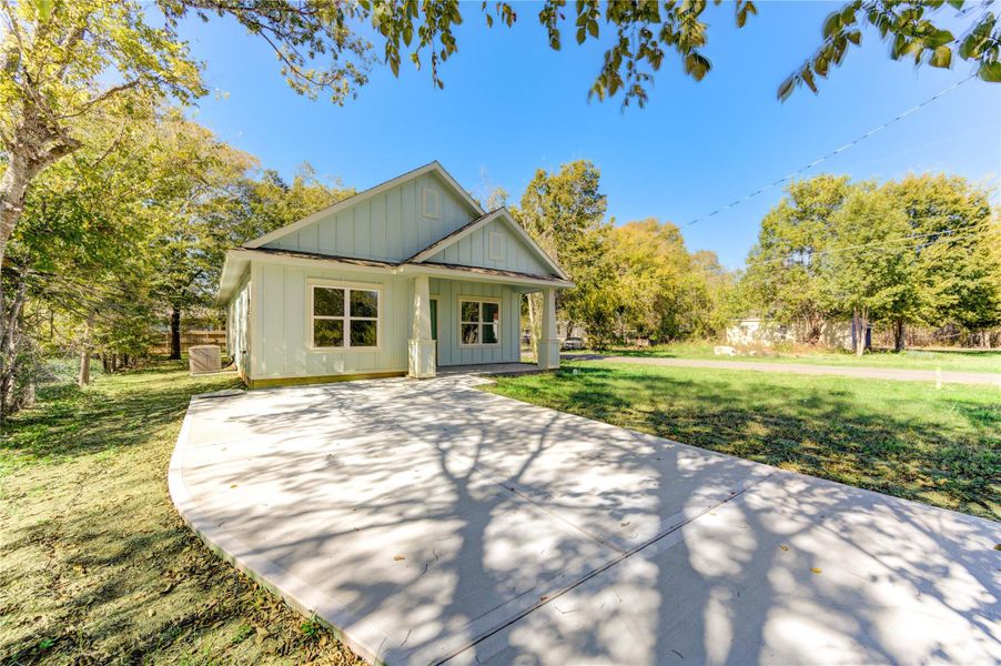 Front exterior of a new home in , Navasota, TX, highlighting curb appeal (Image 2). Front exterior of a new home in , Navasota, TX, highlighting curb appeal (Image 2).