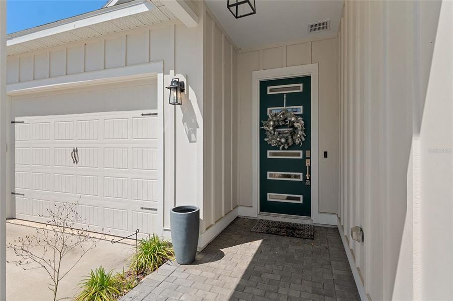 Exterior details and patio area of a home in Fairway Pointe at West End, Newberry (Image 37).