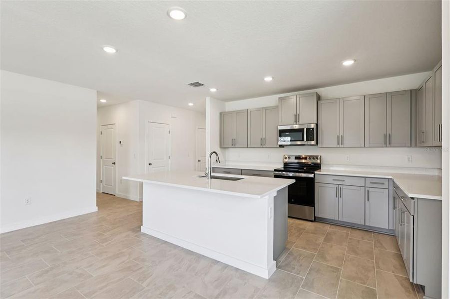 Furnished interior view inside a new home in Willowbrook North, Winter Haven (Image 5).