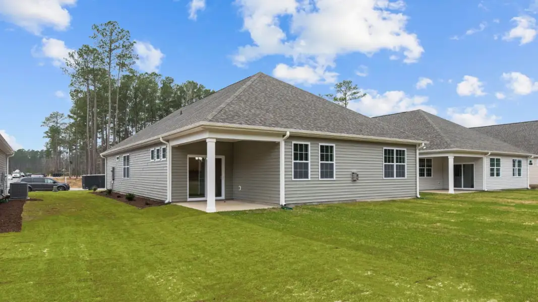 Exterior details and patio area of a home in Chambray, New Bern (Image 17).