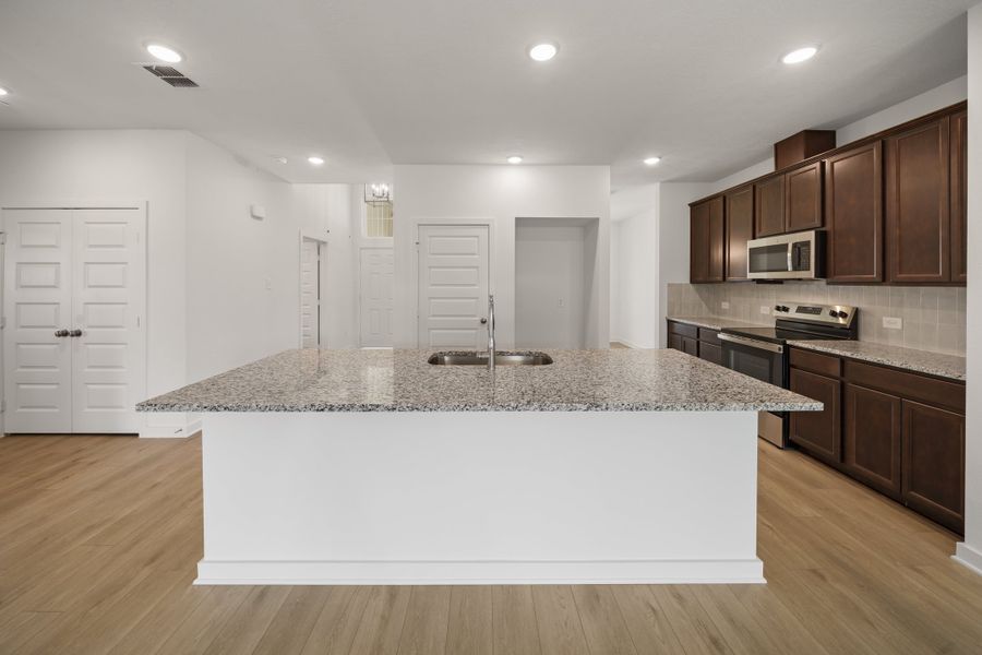 Furnished interior view inside a new home in Highland Oaks, Tyler (Image 3).