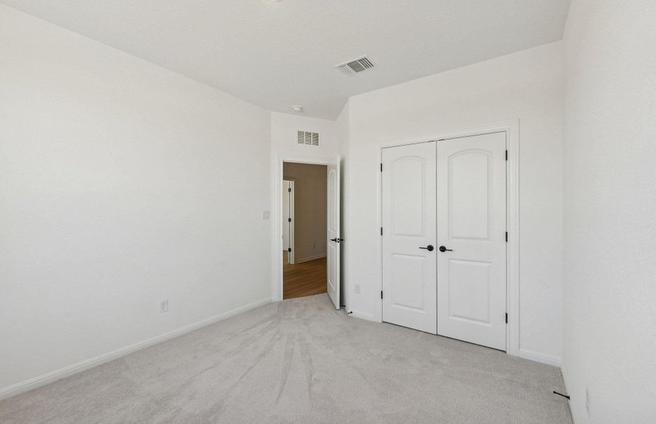 Spacious, unfurnished interior of a new home in Saddleback at Santa Rita Ranch, Liberty Hill (Image 32).