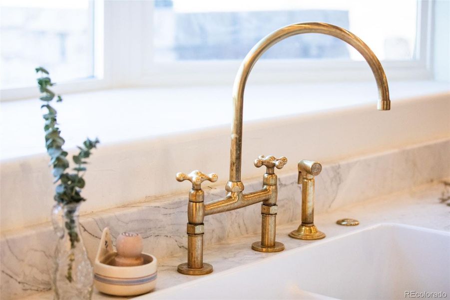 Oversized farm sink with BrassPure Unlacquered Brass Kitchen Faucet