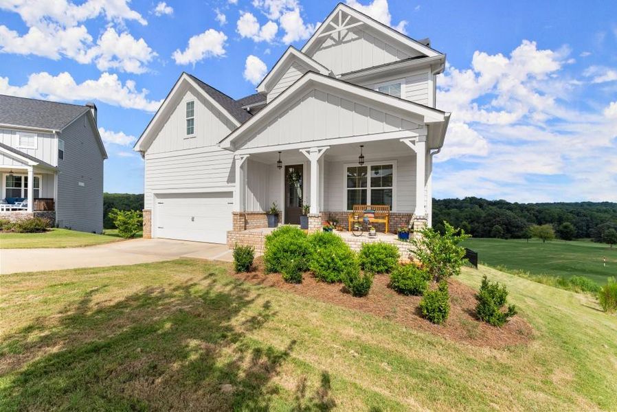 Front exterior of a new home in , Homer, GA, highlighting curb appeal (Image 22).