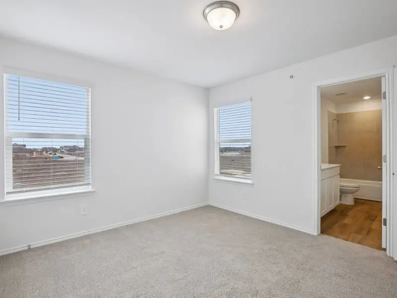 Spacious, unfurnished interior of a new home in Waterstone Village, Kyle (Image 11).