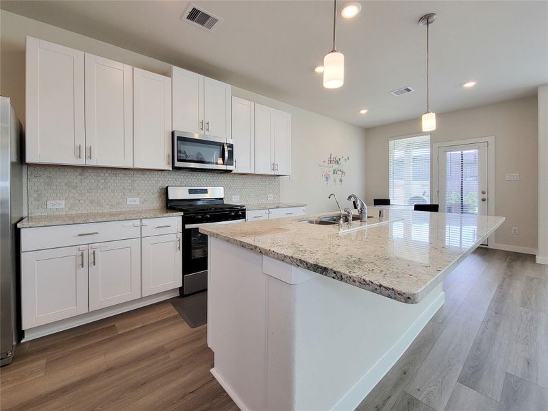 Furnished interior view inside a new home in Creekside Farms, Richmond (Image 37).
