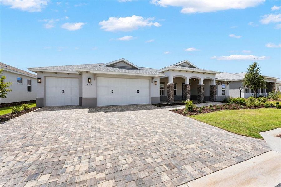 Front exterior of a new home in , Ocala, FL, highlighting curb appeal (Image 21). Front exterior of a new home in , Ocala, FL, highlighting curb appeal (Image 21).