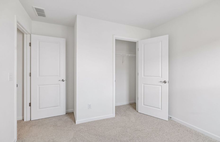 Spacious, unfurnished interior of a new home in Highlands of Carter's Station, Columbia (Image 16).
