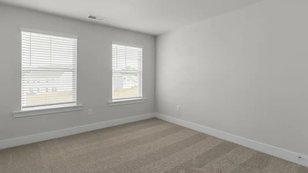 Spacious, unfurnished interior of a new home in The Highlands at Cedar Hill Landing, Navassa (Image 29).