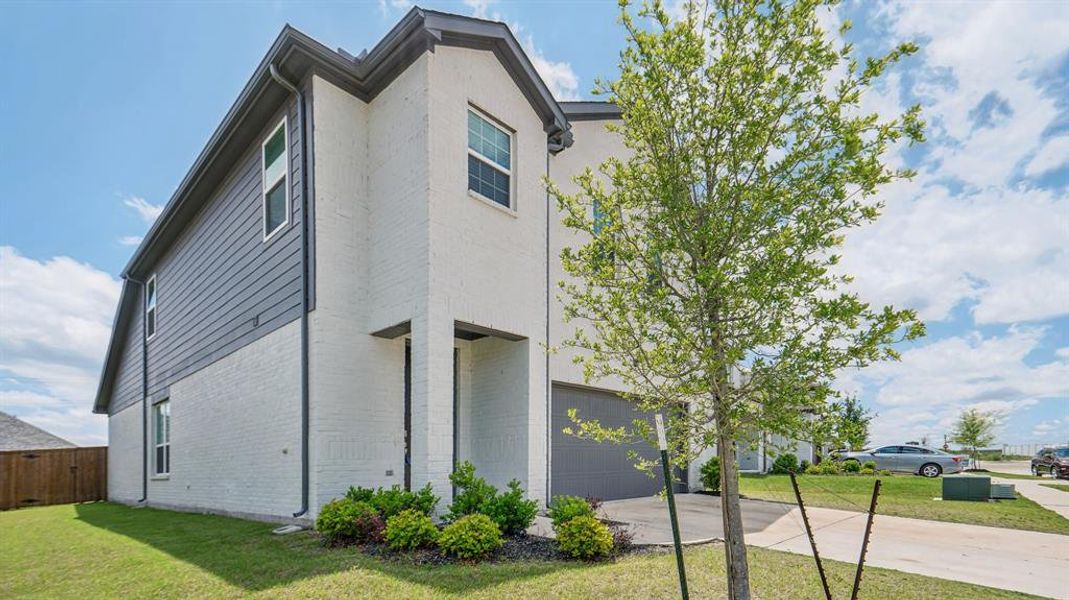 Front exterior of a new home in Venetian, Weston, TX, highlighting curb appeal (Image 23).