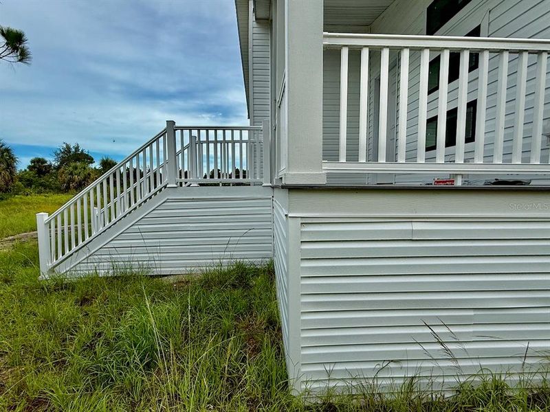 Front exterior of a new home in , Punta Gorda, FL, highlighting curb appeal (Image 29). Front exterior of a new home in , Punta Gorda, FL, highlighting curb appeal (Image 29).