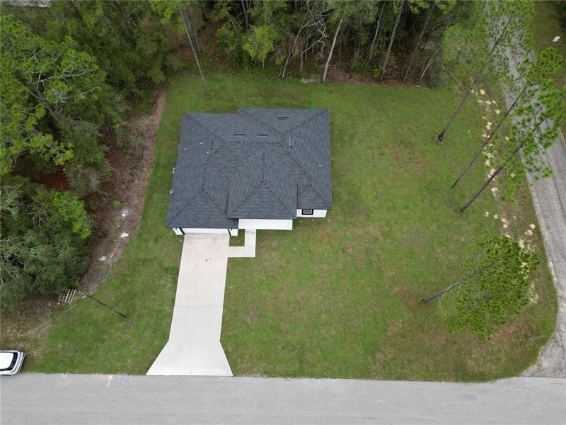 Front exterior of a new home in , Citrus Springs, FL, highlighting curb appeal (Image 29).
