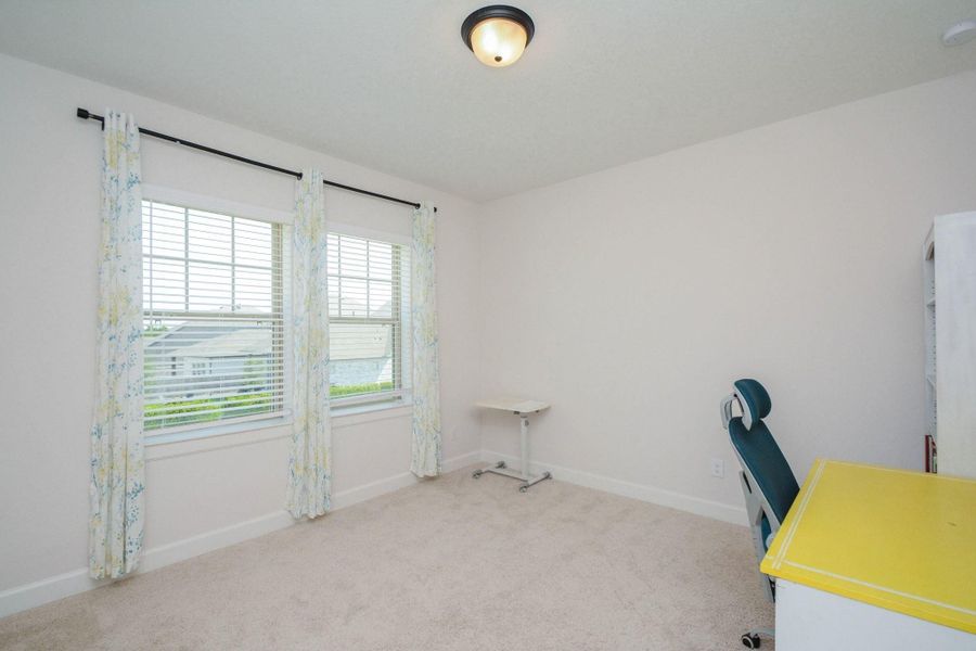 Upstairs Bedroom 1: This secondary bedroom offers the flexibility to serve as a guest suite, home office, nursery, creative studio, or private retreat. Filled with natural light and finished with contemporary style, it's a space designed to adapt as your lifestyle evolves.