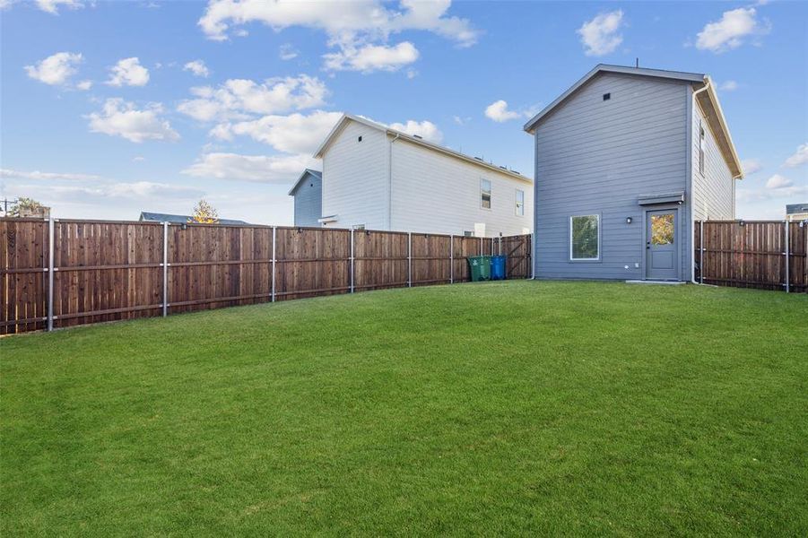 Exterior details and patio area of a home in Foree Ranch: Wellton Collection, Providence Village (Image 3). Exterior details and patio area of a home in Foree Ranch: Wellton Collection, Providence Village (Image 3).