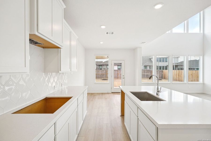 Furnished interior view inside a new home in Estancia Ranch - Classic Series, San Antonio (Image 31).