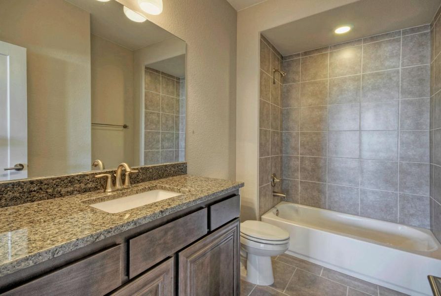 Representative furnished interior of a home built from the Madera II by Giddens Homes in Scofield Farms Estates, Georgetown (Image 155).