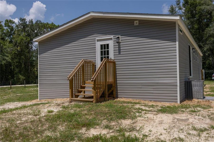 Front exterior of a new home in , Fort White, FL, highlighting curb appeal (Image 20).