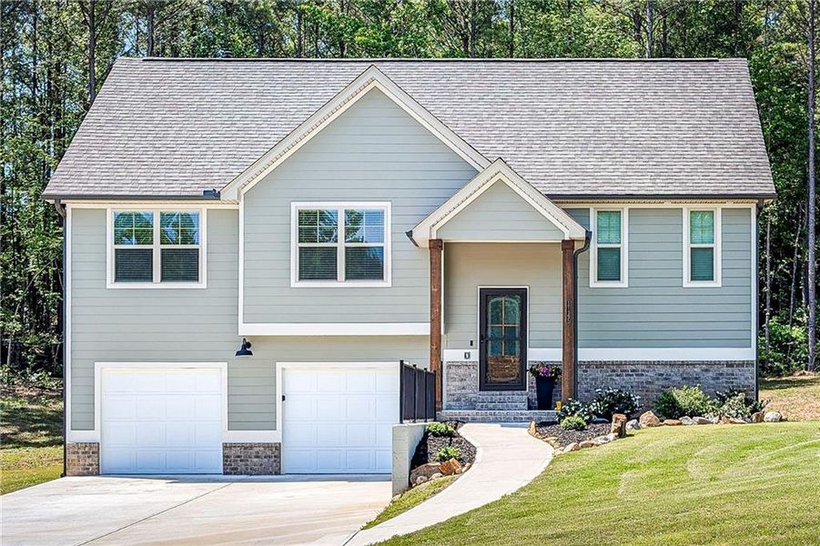 Front exterior of a new home in , Villa Rica, GA, highlighting curb appeal (Image 18). Front exterior of a new home in , Villa Rica, GA, highlighting curb appeal (Image 18).