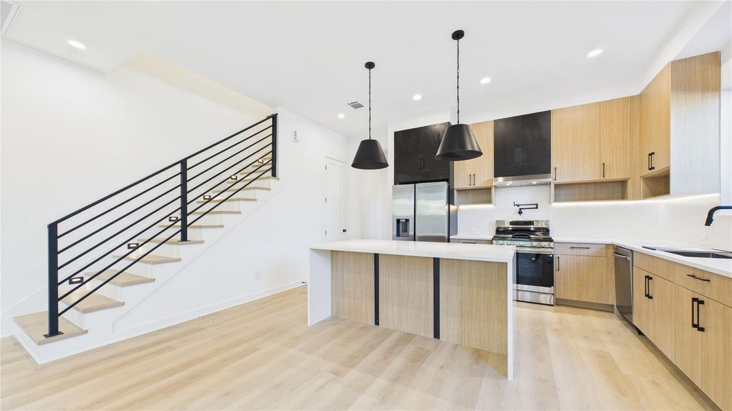 Kitchen waterfall island profile view