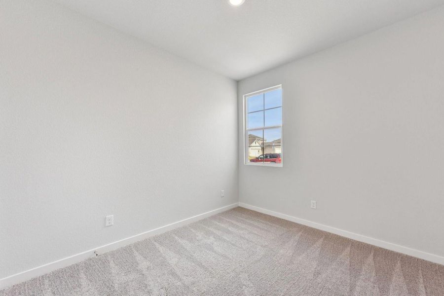 Spacious, unfurnished interior of a new home in Stallion Run, Buda (Image 14).