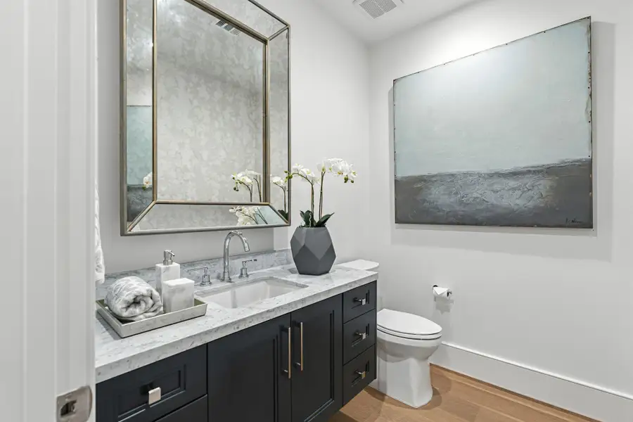 Elegant powder room with sophisticated and stylish design Elegant powder room with sophisticated and stylish design