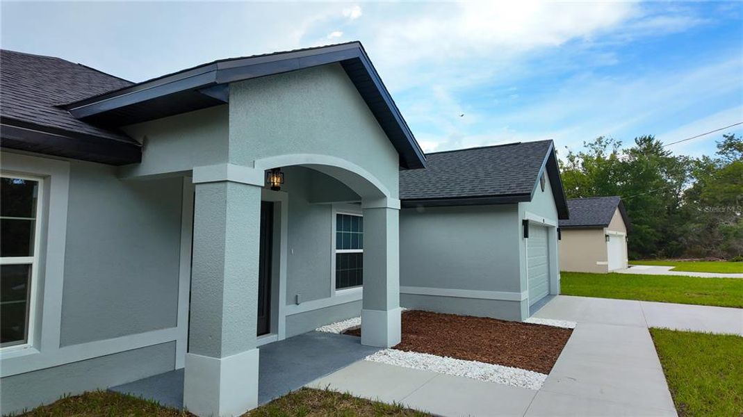 Exterior details and patio area of a home in , Ocala (Image 21).