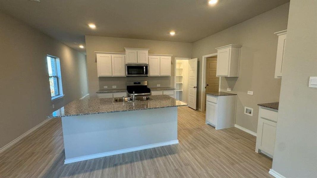 Kitchen- All Home and community information, including pricing, included features, terms, availability and amenities, are subject to change at any time without notice or obligation. All Drawings, pictures, photographs, video, square footages, floor plans, elevations, features, colors and sizes are approximate for illustration purposes only and will vary from the homes as built.