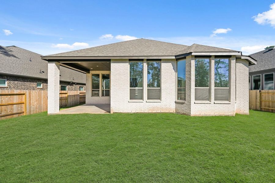 Exterior details and patio area of a home in Grand Central Park: 55ft. lots, Conroe (Image 17).