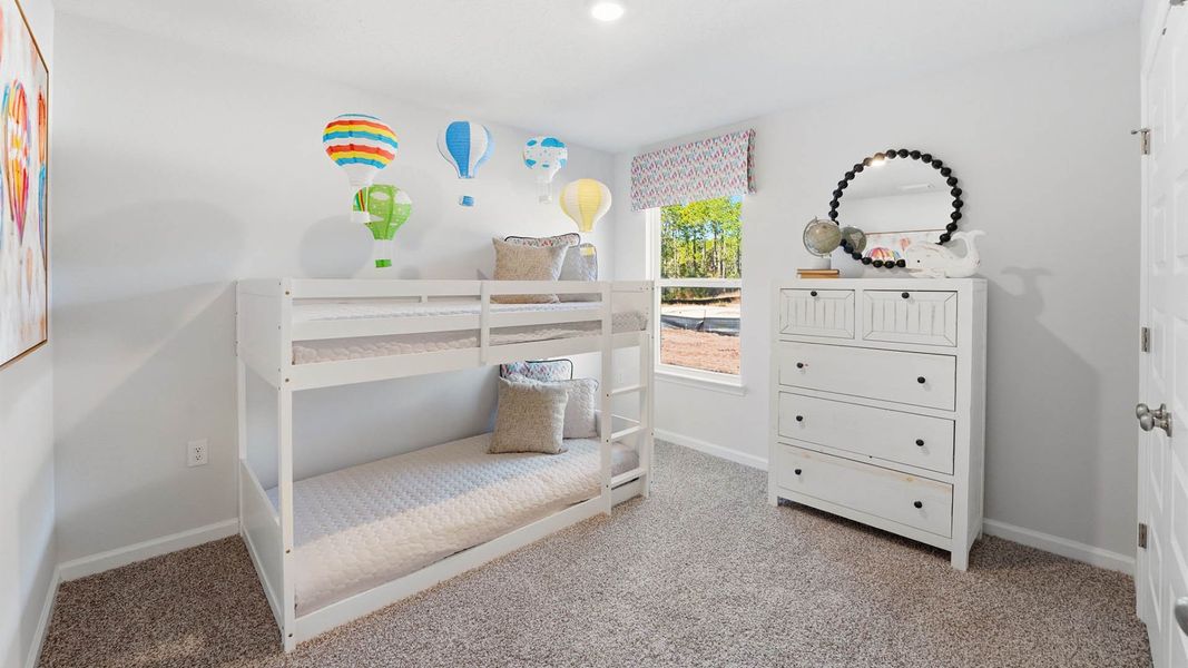 Representative furnished interior of a home built from the The Celeste by D.R. Horton in Chateau Nemours, Port Saint Joe (Image 26).